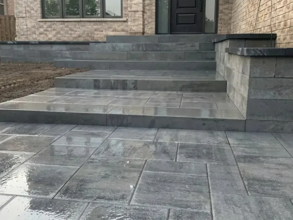 Durable and stylish stone steps at a residential entrance